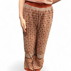 Women's Orange and brown patterned wide leg trousers by M2K no size tag runs Med